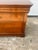 A handsome French Mid-Century Modern commode crafted in walnut, blending clean 1960s design with the timeless elegance of...