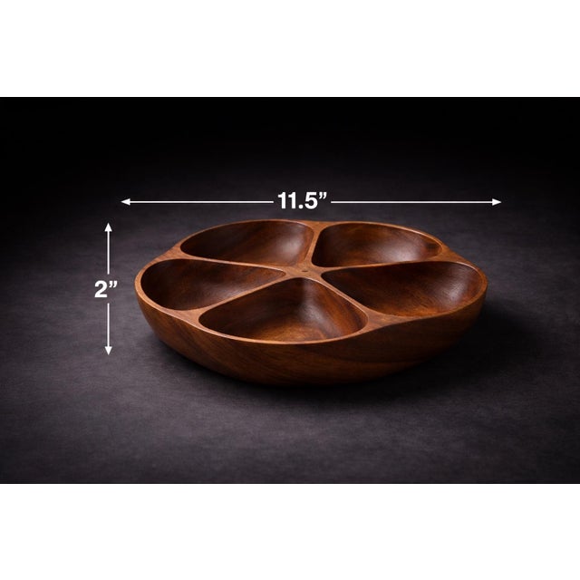 A classic mid-century entertaining set in richly grained monkey pod wood, featuring a five-section serving tray and five...