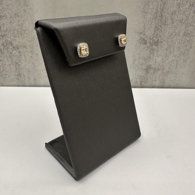 Add a pop of vibrant luxury to your collection with these Luscious Yellow Diamond Stud Earrings, crafted in elegant 14kt...