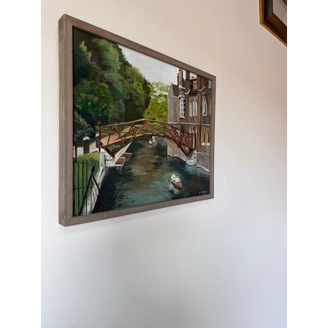 Charming 1982 oil on canvas landscape painting by N. Cianfrani depicting a picturesque European canal village scene. The...