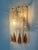 Gorgeous and lovely set of italian amber dark murano glass wall sconces from 1970s. These fixtures were designed and...