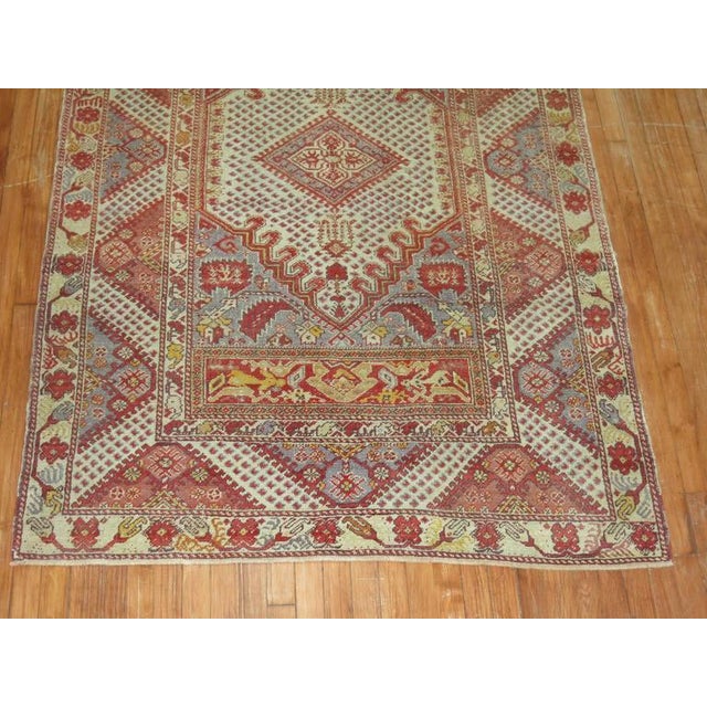 Authentic one of a kind Turkish Ghiordes rug. 4'7'' x 7'2'' Since the beginning of their production in the 18th century,...