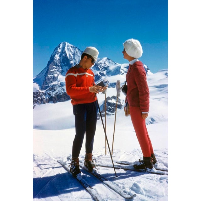 Skiing the Haute Route by Toni Frissell Two Skiers pause on their journey through the infamous “Haute Route", Switzerland,...