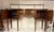 Lovely serpantine sideboard by Statton featuring inlaid medallion design, spacers on legs and a gallery rail. This classic...