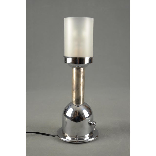 A rare Art Deco table lamp designed by Jean Boris Lacroix and produced by Metis, France, during the 1930s. The design...