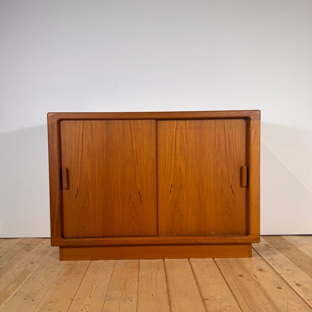Danish teak sideboard with sliding doors, 1960s