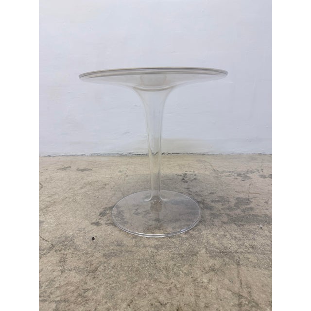 Bright white plastic top Tip Top side table with transparent base by Eugeni Quitllet and Philippe Starck for Kartell, 2010s.