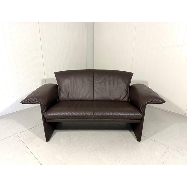 Sofa Indy by Christophe Giraud for Jori, Belgium (marked). Two-seats sofa in in dark brown thick leather, adjustable arm...