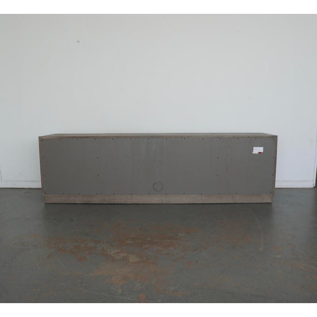 Crafted of solid oak and fine oak veneers, this Restoration Hardware Herringbone 4-Door Media Console showcases meticulous...