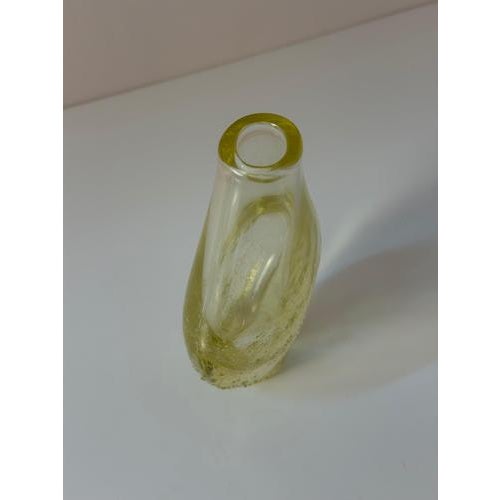 Czech glass art of the Mid-Century era: This butter-yellow glass vase, designed by renowned designer Miloslav Klinger for...