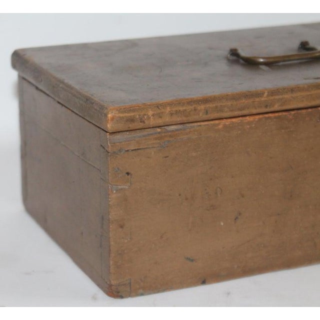 19th century original taupe painted dovetailed document box from New England. The original brass handled.