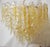 Italian chandelier shown with hand blown clear and amber Murano glass leaves, mounted on 24-karat gold-plated frame by...