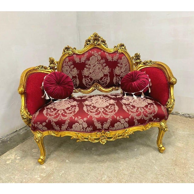 Bring timeless European grandeur into your home with the Royal Bordeaux Rococo Loveseat, an extraordinary handcrafted...
