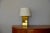 The ‘Croisillon’ polished brass and parchment table lamp by Design Frères. Custom cream parchment European style shade...