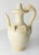 We are selling this Chinese Tang Dynasty style straw cream Qingbai style glazed ewer pitcher. This pitcher has a clear...