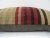 This is a pillow cover made from a vintage kilim rug. The piece was properly washed and ready to use. Pillow inserts not...