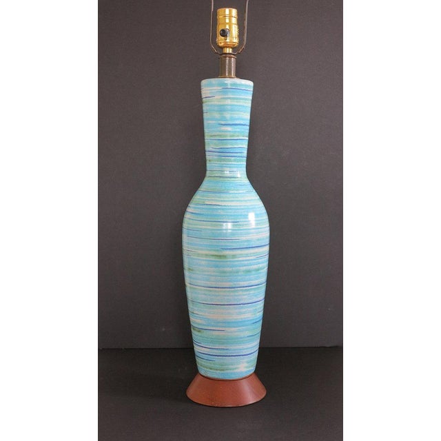 A wonderful mid-1950s ceramic lamp by the esteemed firm of design-technics. This lamp appears in the design-technics...