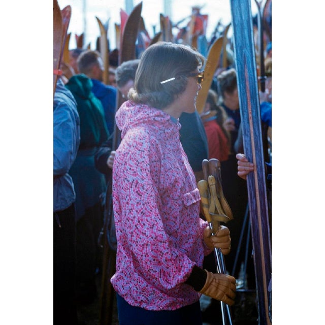 Party in Pink by Toni Frissell A woman in a bright pink parka parties at ski resort in Zermatt, Switzerland, 1956. (Toni...