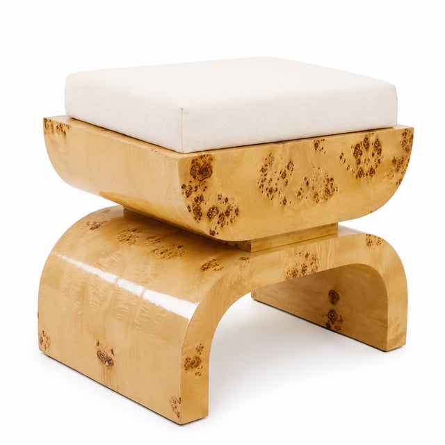 The Matthew Izzo Home Biggs Burlwood Stool Pair brings together organic materiality and sculptural design in a refined,...