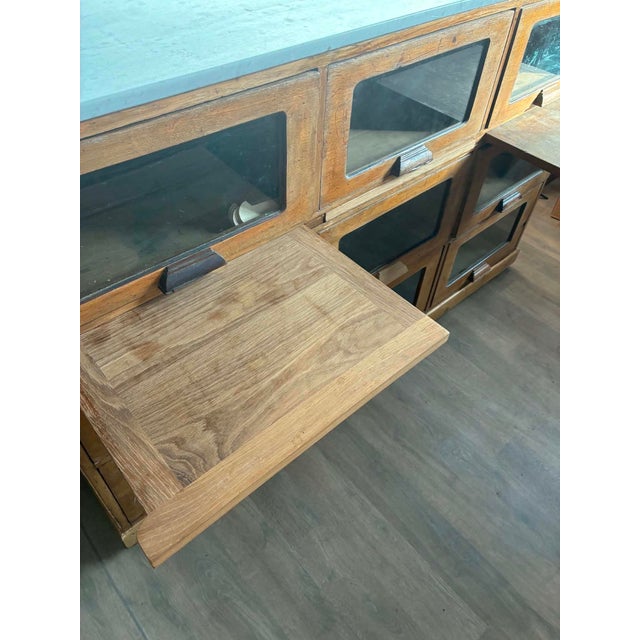 Stunning storage unit, formerly a seed merchant's cabinet. It will complement any room; a piece of furniture with...