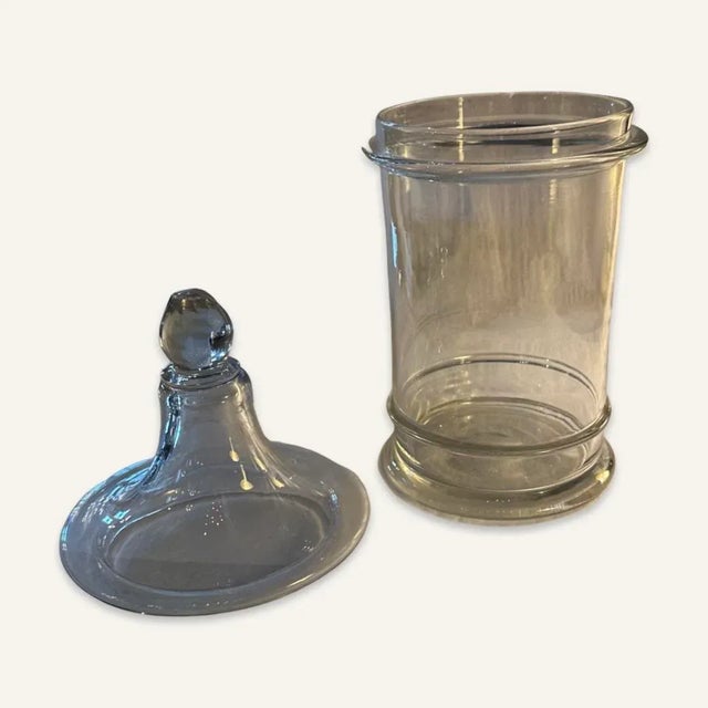 Late 19th/early 20th century Pittsburgh glass jar with lid. The finial is faceted and shows signs of wear with tiny chips....