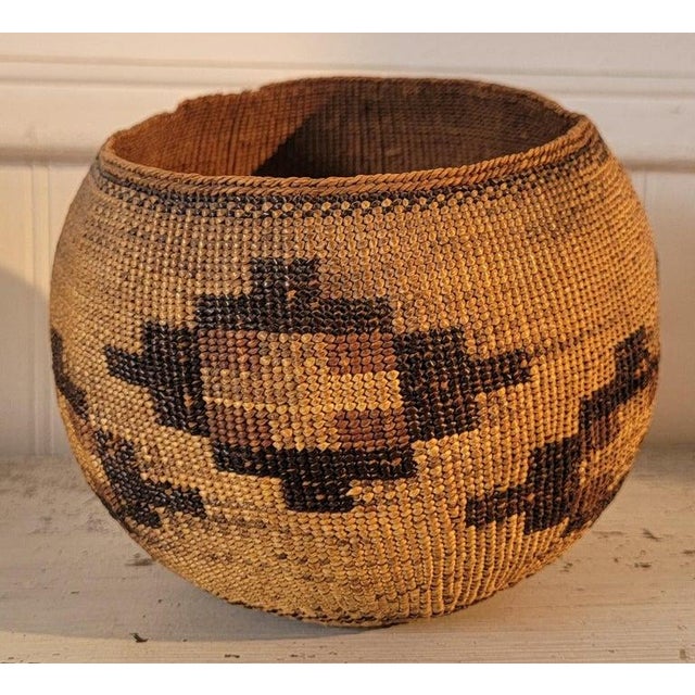 Hand made basket from hemp and a devils grass. Hand dyed fibers create a wonderful geometric pattern. Tightly woven and in...