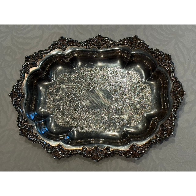 An exceptionally detailed vintage rectangular serving platter / hollowware dish manufactured by the Crown Silver Company...
