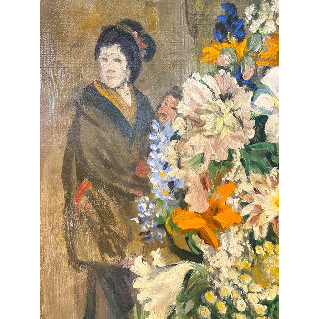 An early 20th century still life oil painting on canvas with vases filled with blooming florals and charming details of an...