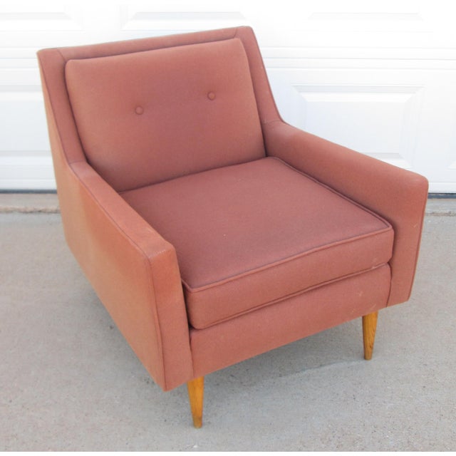 Vintage mid century modern slipper lounge chair. The chair does not have a maker mark or label and is in a similar style...