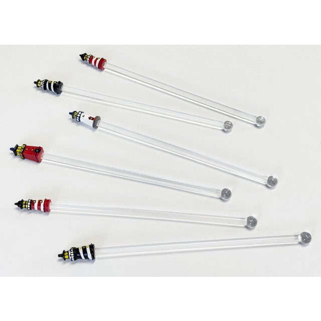 Charming set of six (6) vintage nautical lighthouse motif blown glass swizzle sticks. Age wear. No chips or cracks.