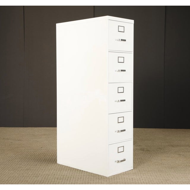 Classic mid-century five-drawer steel filing cabinet dating to the 1950s. This piece features a clean industrial...