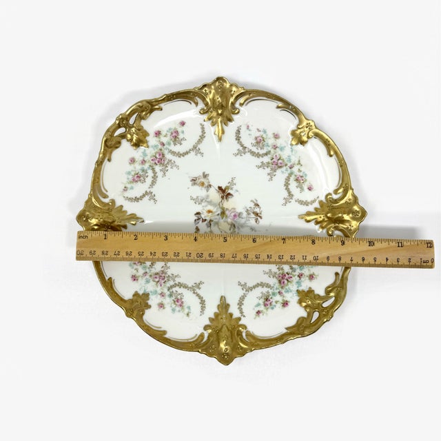 Enhance your collection with this exquisite RS Prussia Porcelain Cake Plate, a masterpiece of late 19th/early 20th-century...