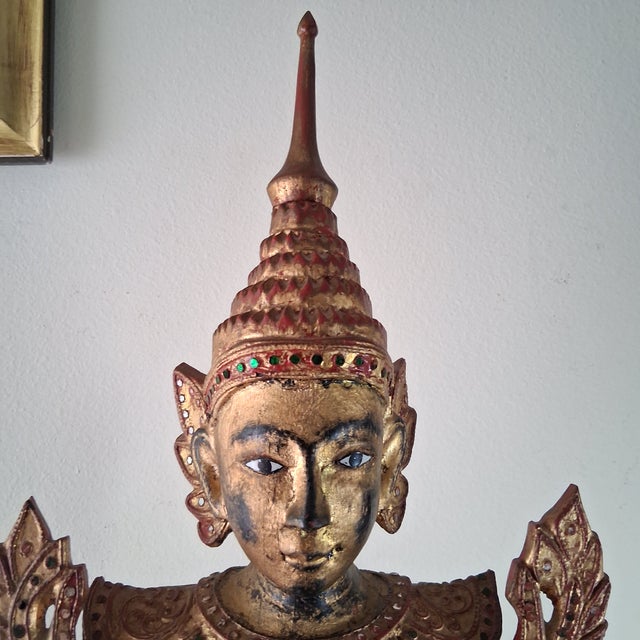 Large Burmese Carved Gilt Wood Theppanom Guardian Statue from the late 19th to early 20th century. Excellent overall...
