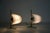 This exceptional pair of Italian table lamps from the 1950s captivates with their sculptural, sailboat-inspired design....