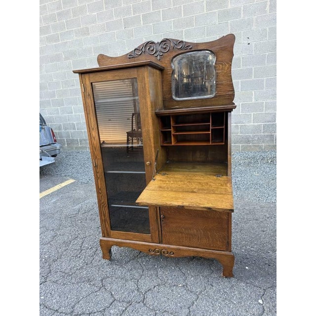 Antique Larkin Style Tiger Oak Side-by-Side Secretary Desk It features Drop Front Writing Desk and Adjustable Shelves...