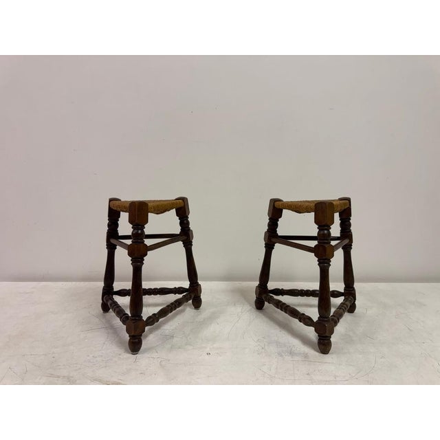 This charming pair of oak and rush stools showcases traditional craftsmanship and honest, time-honoured materials. Each...