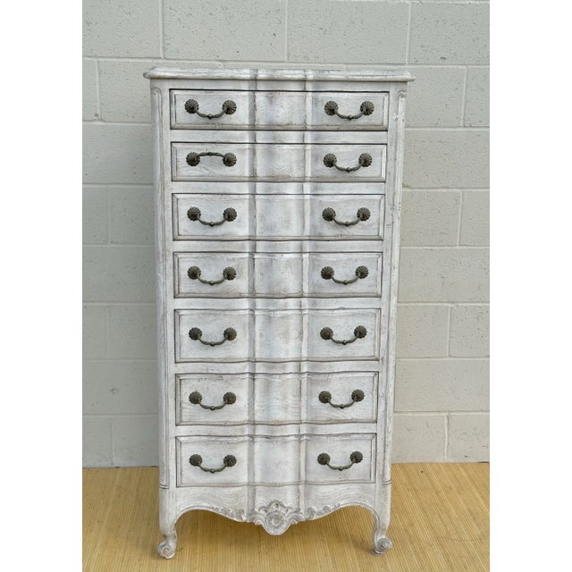 Wonderful Country French highboy designed by John Widdicomb, it has the designer mark in the first drawer. It has seven...