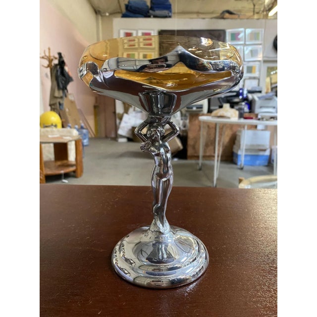 Vintage Farberware compote featuring a chrome stem with a nude woman having a Cambridge insert from 1932. The compote...