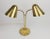 Double brass lamp whose lampshades mounted on ball joints are adjustable, created by Jacques Biny around 1950-60. I have...