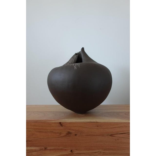Vestiges i sculptural ceramic vase by audrey vo van dimensions: d 28 x w 28 x h 33 cm materials: black clay (stoneware) -...