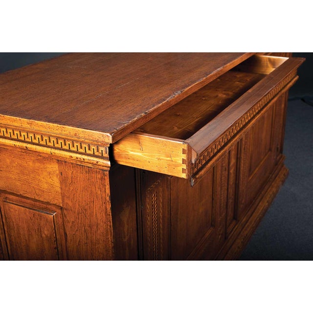 Handcrafted in Italy, this 16th Century Tuscany style sideboard is constructed from solid walnut and accented with maple...