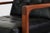 A stately design. Built on a walnut base with a confident stance. The chair has a highback seat with tufted back buttons...