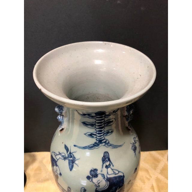This Antique Large Chinese Blue and White Porcelain Vase #2, A large antique porcelain blue and white vase decorated with...