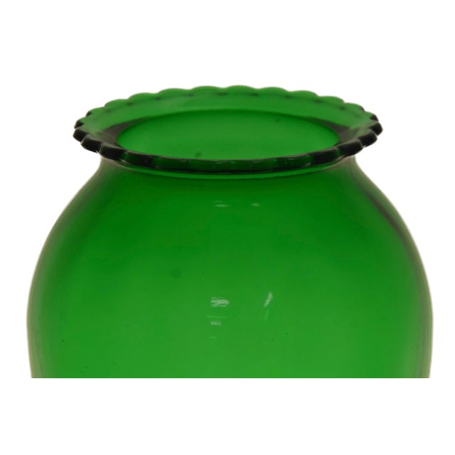 Tall nine inch emerald kelly forest green glass vase with gentle scallop rim. Simply a beautiful vintage addition to the...