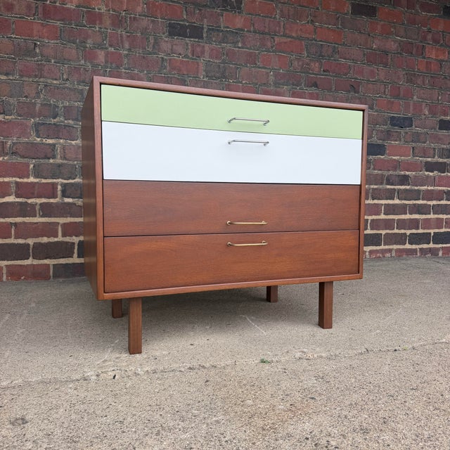 This is a beautiful professionally refinished Jens Risom chest of drawers. It features a sage green painted top drawer and...