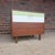 This is a beautiful professionally refinished Jens Risom chest of drawers. It features a sage green painted top drawer and...