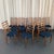 This set of twelve Scandinavian Modern dining chairs was designed and produced by the notable Swedish furniture...