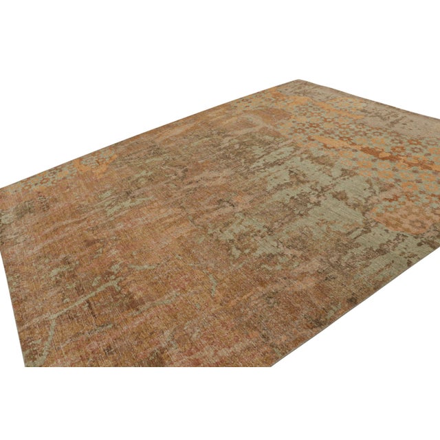 Hand-knotted in wool, this 9x12 modern rug, originating from India, as inspired by modern art with a take on floral...