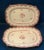 A beautiful pair of Chinese export platters of small size decorated in bright puce with floral bouquets and a geometric...