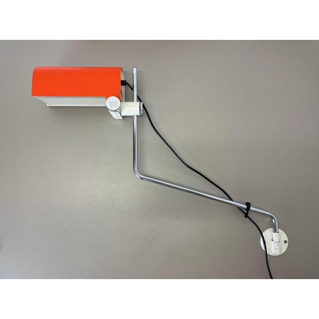 Article: Wall light Producer: Doria lights, Germany Design: Wilhelm Braun-Feldweg Origin: Germany Age: 1970s This 1970s...